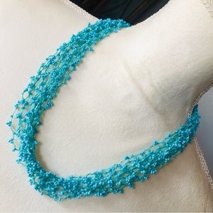 Handcrafted turquoise tone multi strand crochet beaded necklace